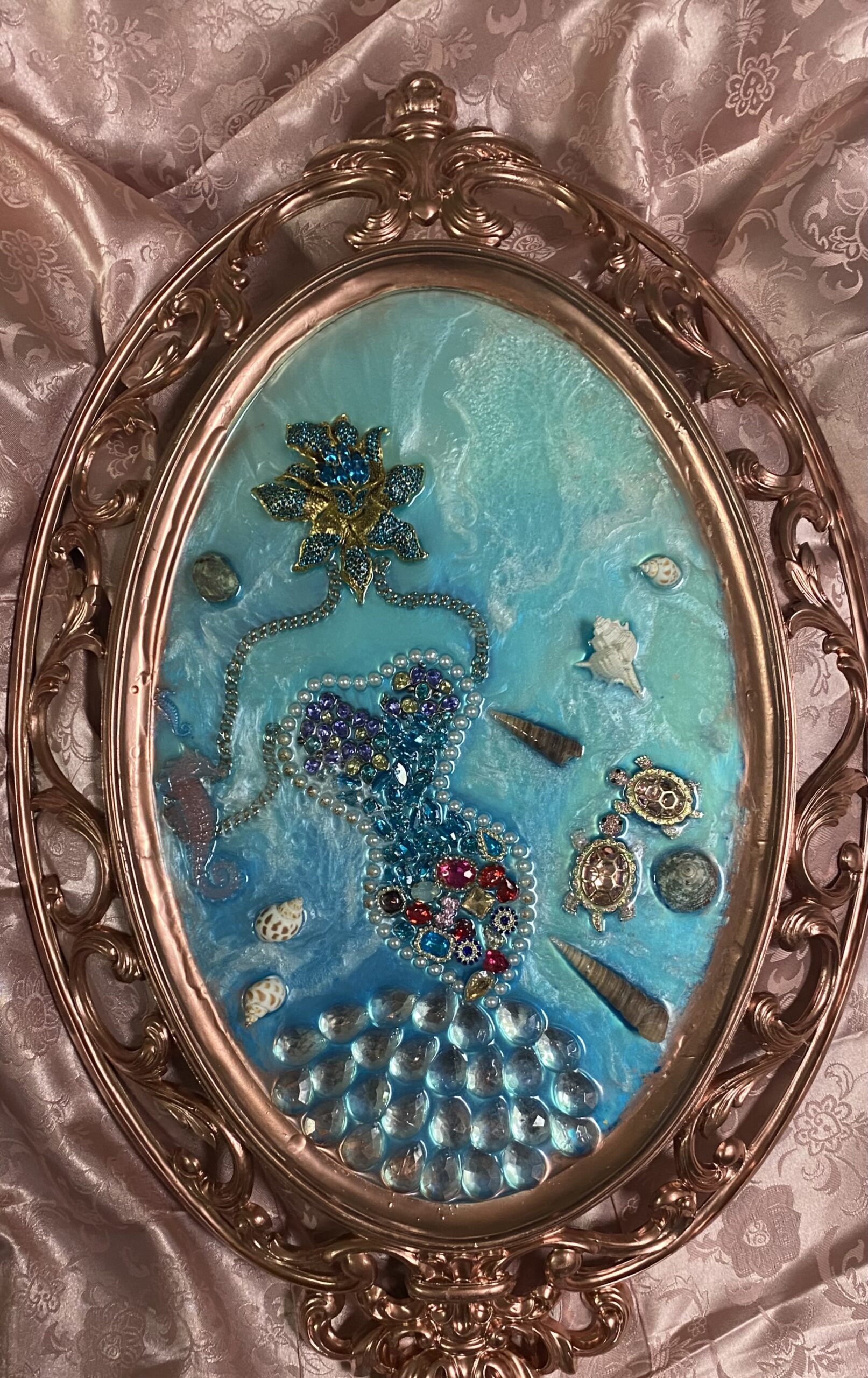 Bejeweled Mermaid on Ocean Scene, Made with crystals, vintage brooches over a rose gold vintage mirror